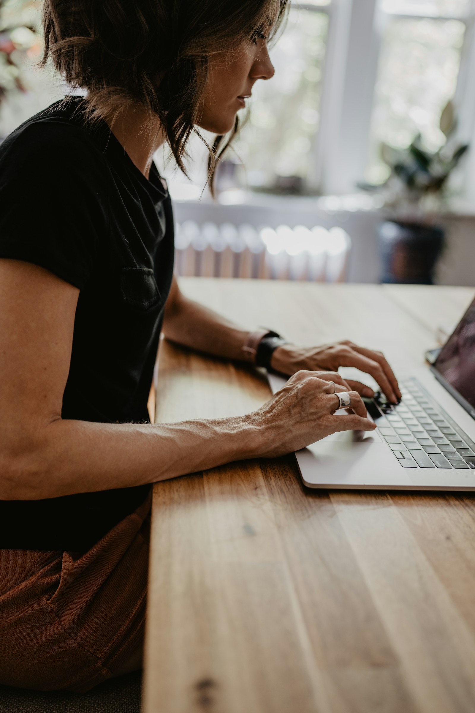 A woman using her laptop at home